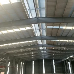 Bright yellow pultruded FRP fiberglass purlins under installation at construction site, high strength fiberglass purlin beams for industrial roof framing - Mingchi FRP