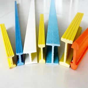 Various colored fiberglass reinforced plastic FRP structural profiles including I-beams