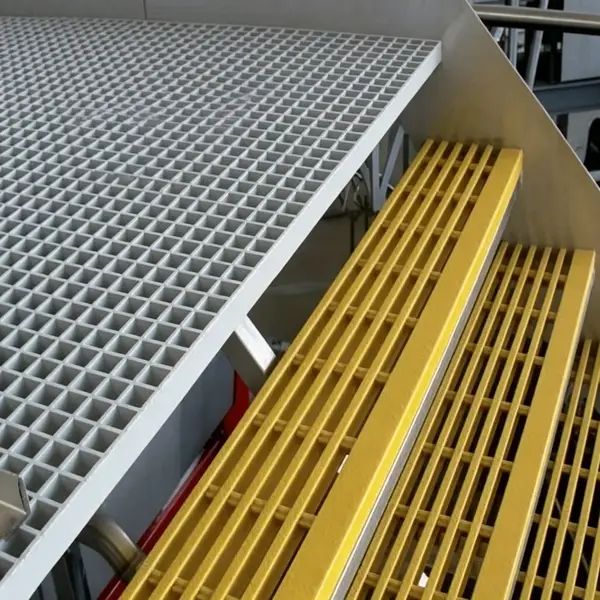 Yellow fiberglass safety railing and FRP grating walkway in wastewater treatment plant