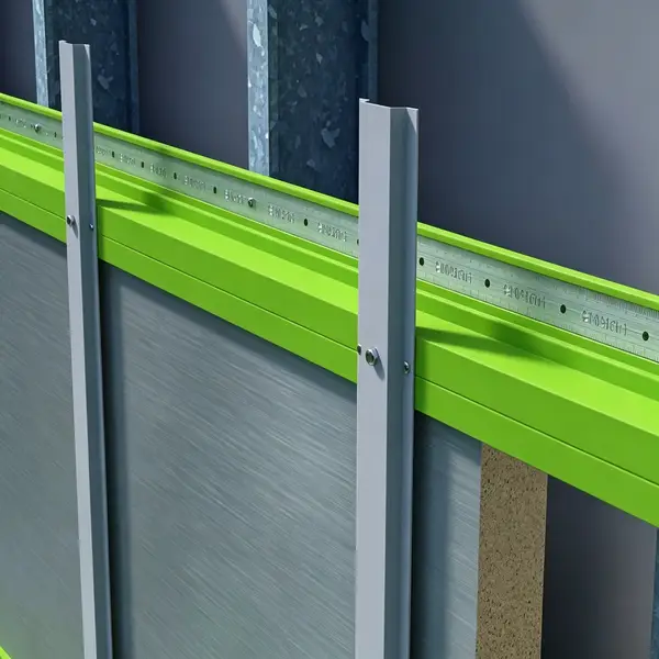 Green fiberglass angle profile used as wall framing trim in construction