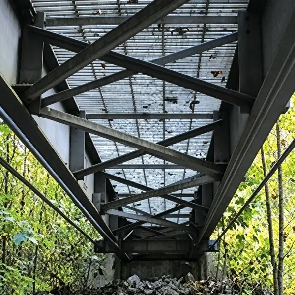 Underside view of FRP I-beam bridge structure with composite decking