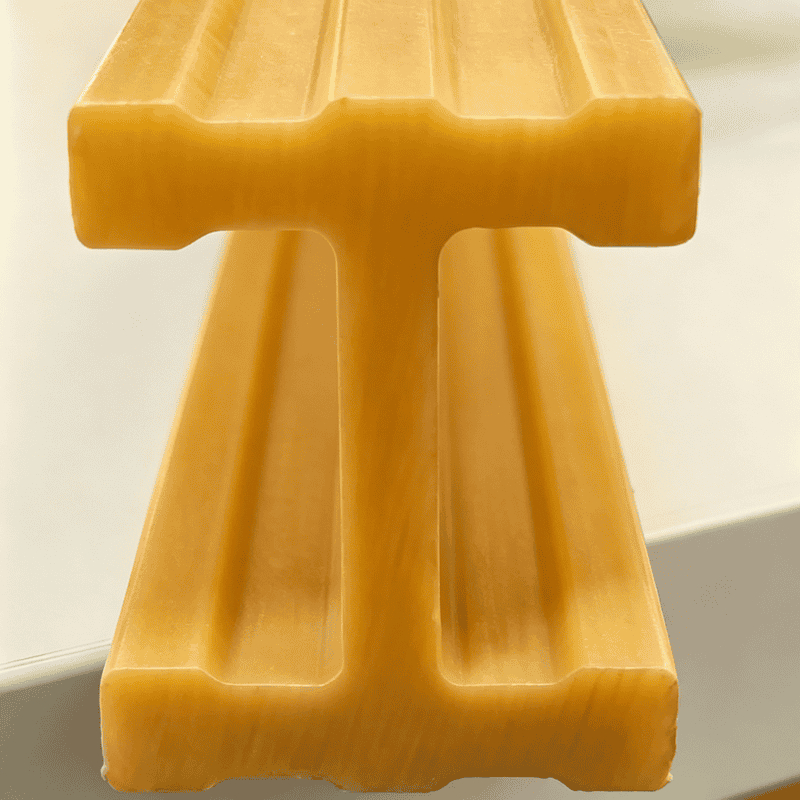 Yellow safety-rated FRP I-beam, high-visibility fiberglass structural beam for walkway support in corrosive environments