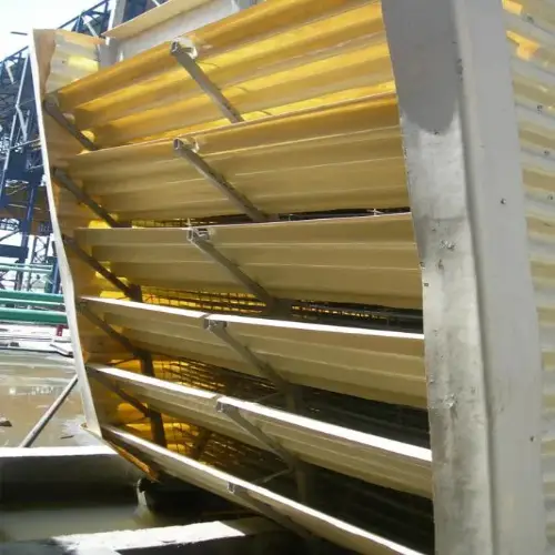 Fiberglass angle supports installed along cooling tower louver panels