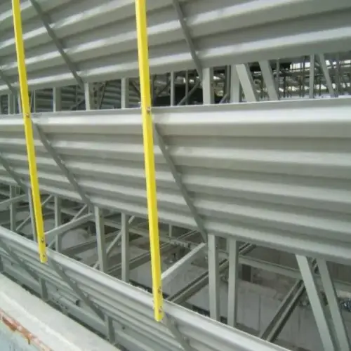 Fiberglass angle backing supports behind cooling tower air intake louvers