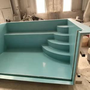 Fiberglass inground pool with curved built-in bench steps